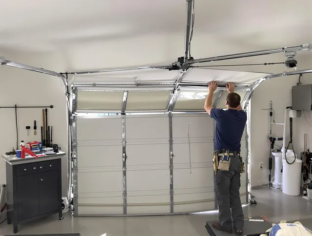 Beaumont Garage Door Repair specialist performing precise section replacement on Beaumont garage door